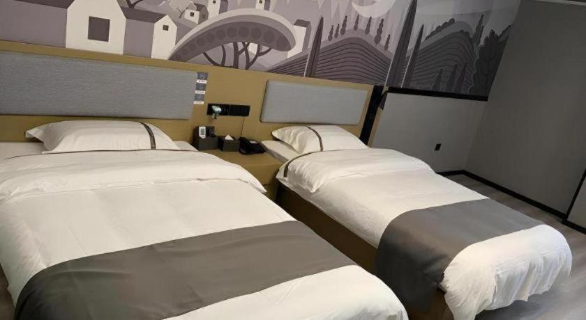Thank Inn Hotel Anqing Guangcai Big Market Passenger Center מראה חיצוני תמונה
